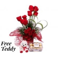 Roses rouges avec des chocolats Ferrero et un nounours gratuit