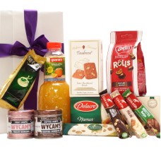 Granini de jus de fruits et paquet de bonbons belges en cadeau